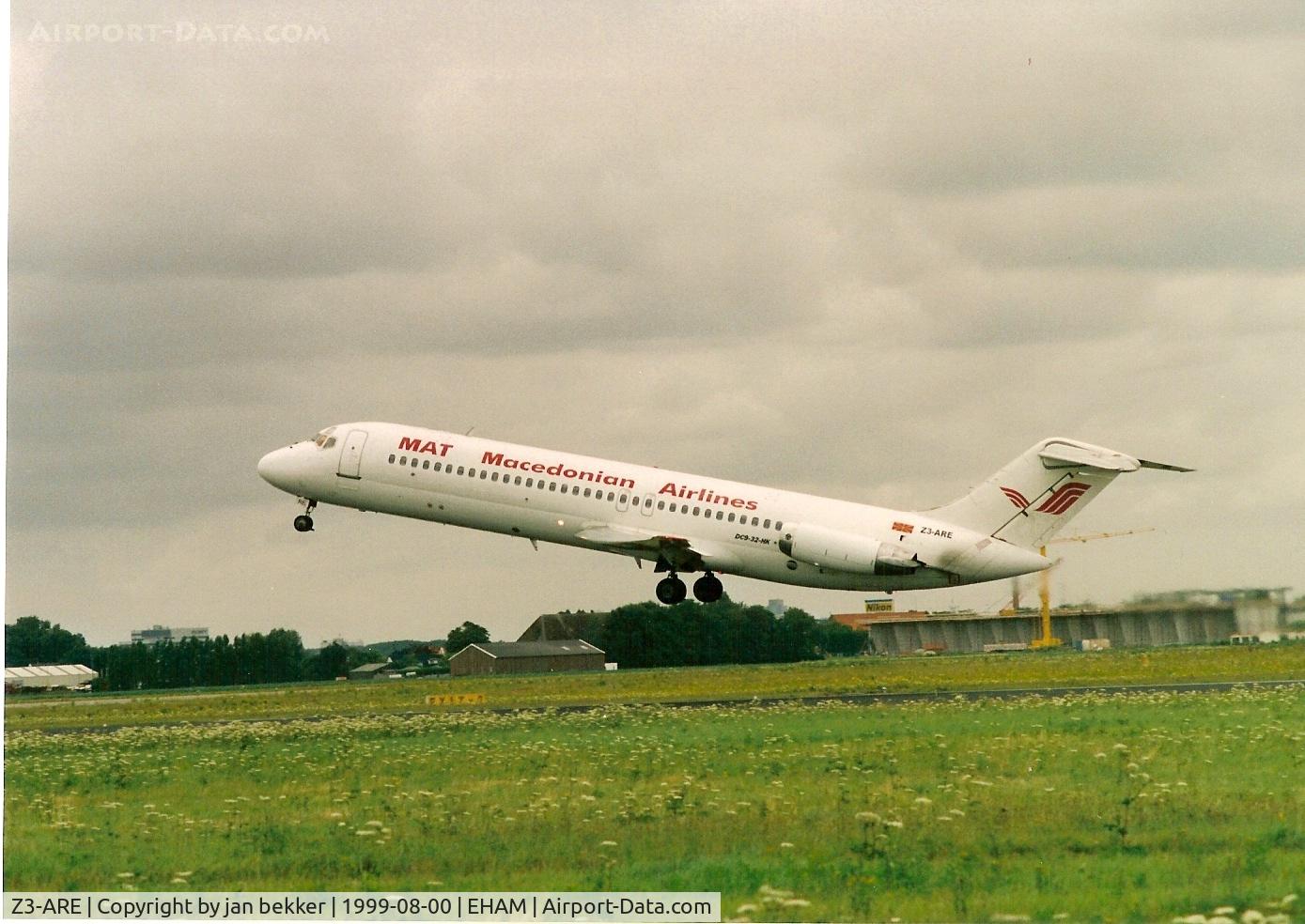 Z3-ARE, 1973 Douglas DC-9-32 C/N 47567, Taking off from Schiphol in August 1999