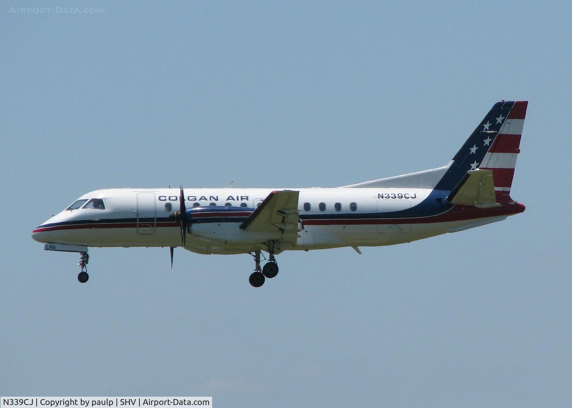 N339CJ, Saab 340B C/N 340B-339, Landing on runway 14 at the Shreveport Regional airport.