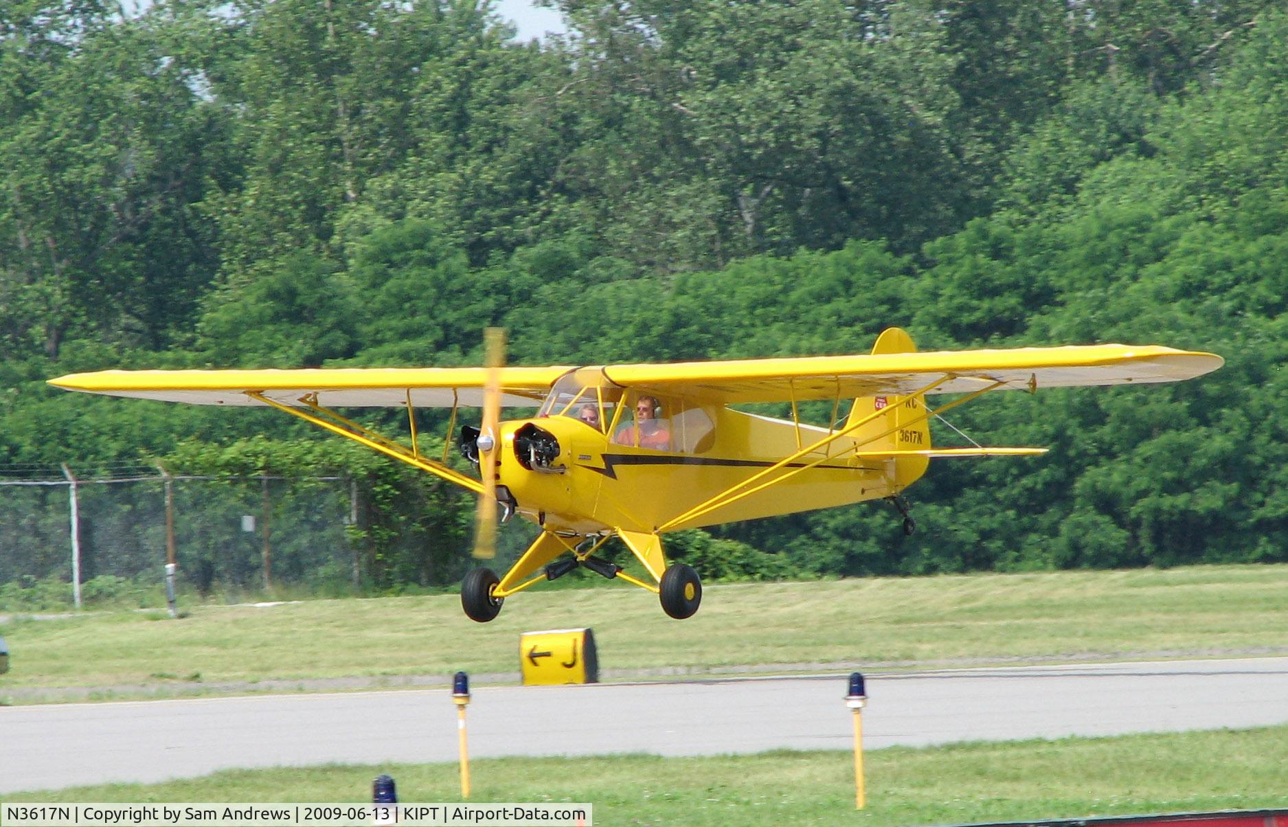 N3617N, 1947 Piper J3C-65 Cub C/N 22865, Arriving at the 2009 WRAP Fly-In Pancake Breakfast