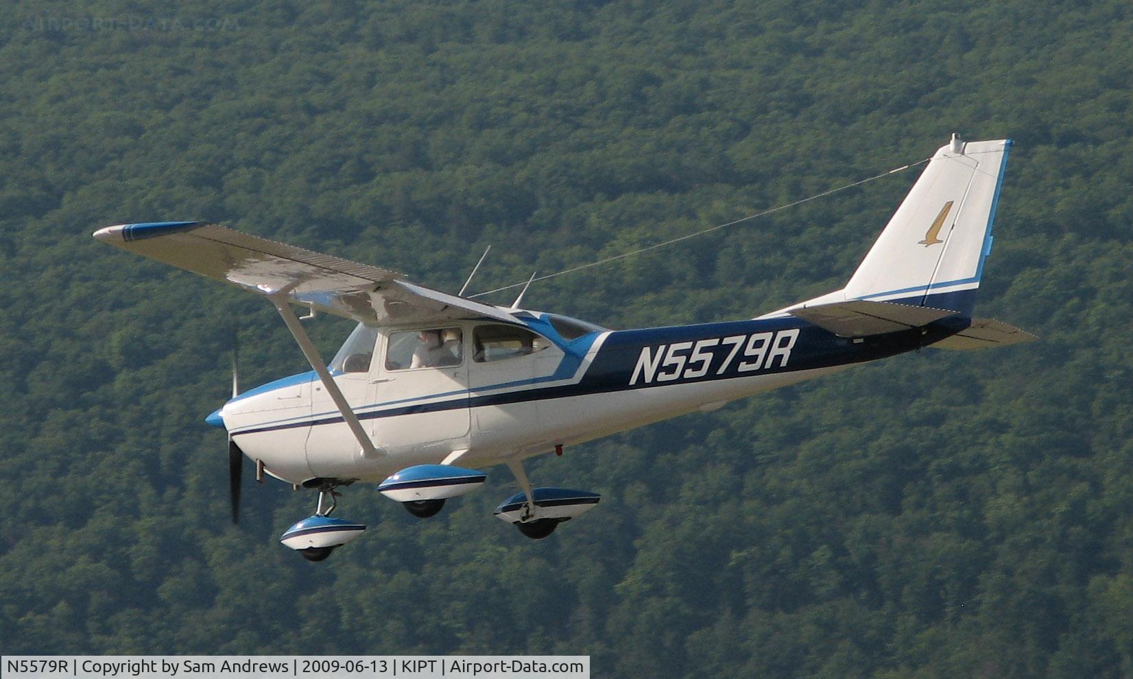 N5579R, 1965 Cessna 172F C/N 17253177, Arriving (very high) at the 2009 WRAP Fly-In Pancake Breakfast