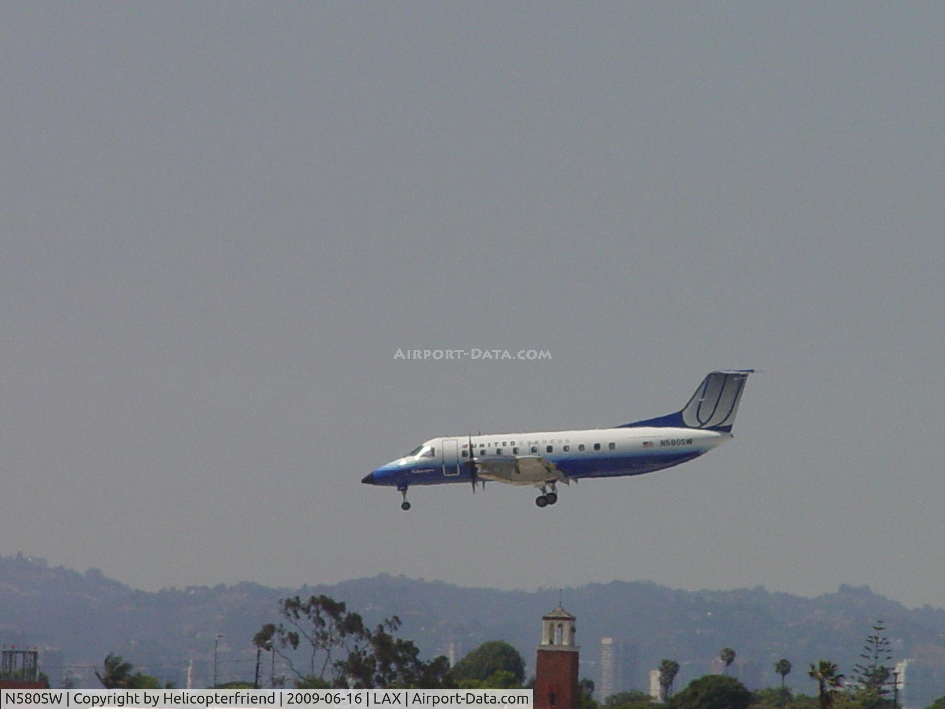 N580SW, 1999 Embraer EMB-120ER Brasilia C/N 120348, Landing 24R