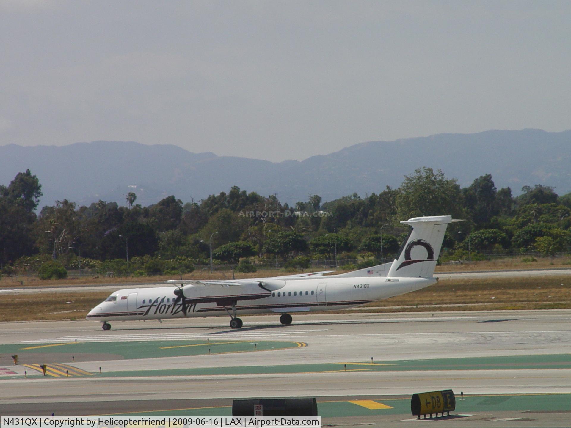 N431QX, 2007 Bombardier DHC-8-402 Dash 8 C/N 4164, Rolling on take off 24L