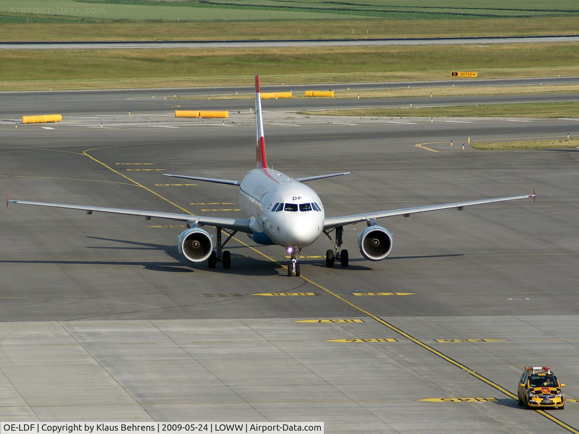 OE-LDF, 2005 Airbus A319-112 C/N 2547, OS Airbus A 319 and a `follow me car'.