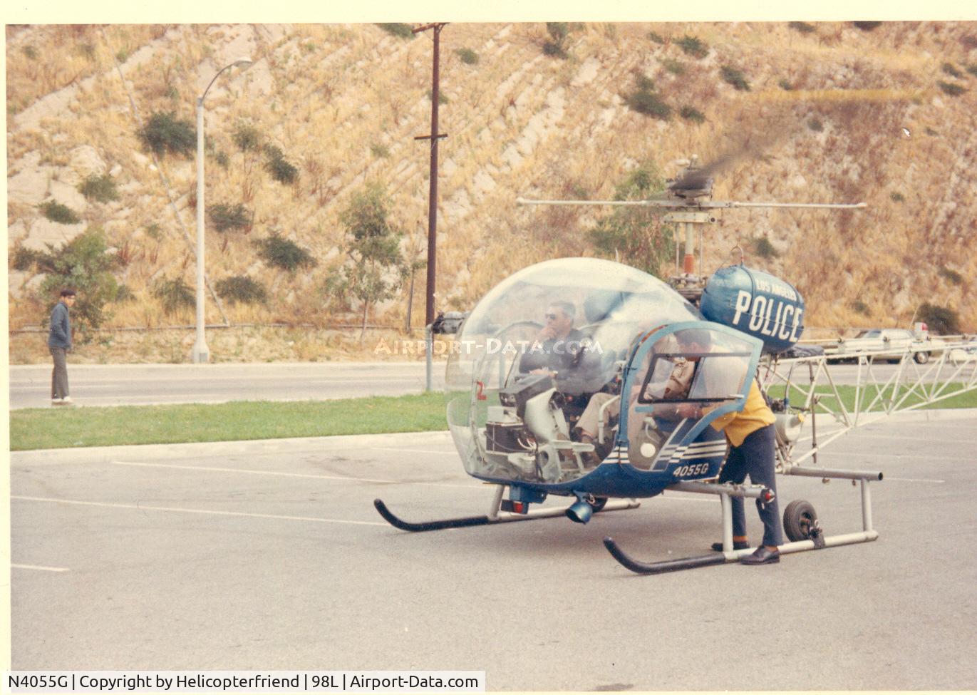 N4055G, 1968 Bell 47G-3B-2 C/N 6682, Picture sent by Pilot E Newman. He is the pilot sitting in the bird when it landed at Pomona PD Range 98L prior to Pomona PD Aero Bureau start up. Newman became Chief Pilot