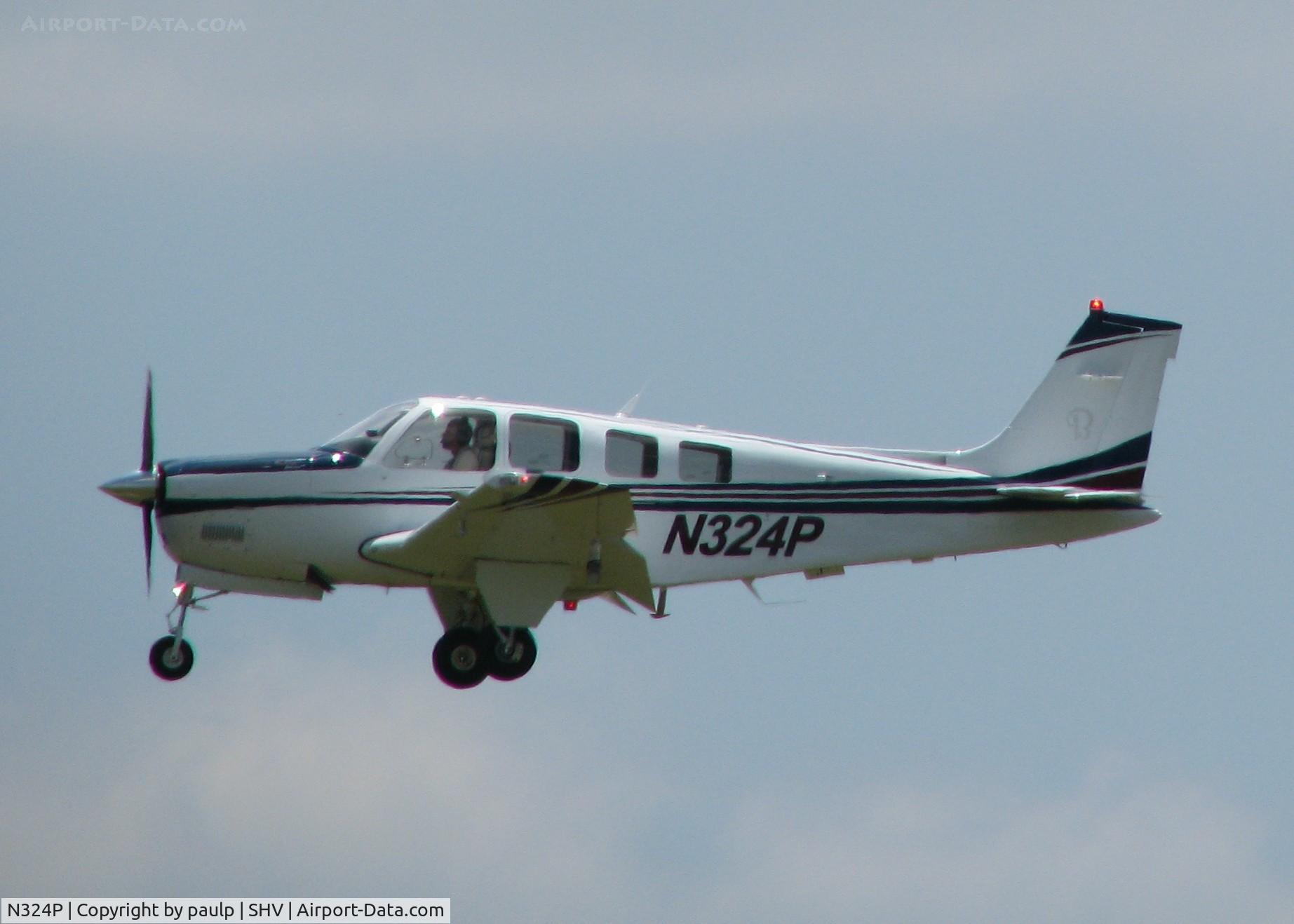 N324P, 2006 Beech G36 Bonanza C/N E-3730, Landing at the Shreveport Regional airport.