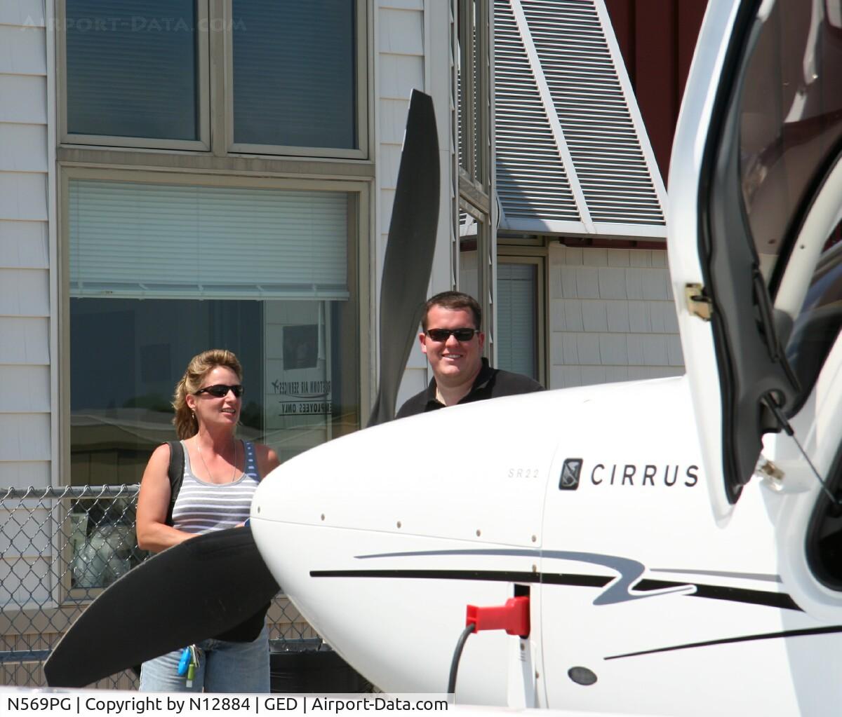 N569PG, 2008 Cirrus SR22 C/N 3003, Cirrus rep speaking to potential clients at the open house
