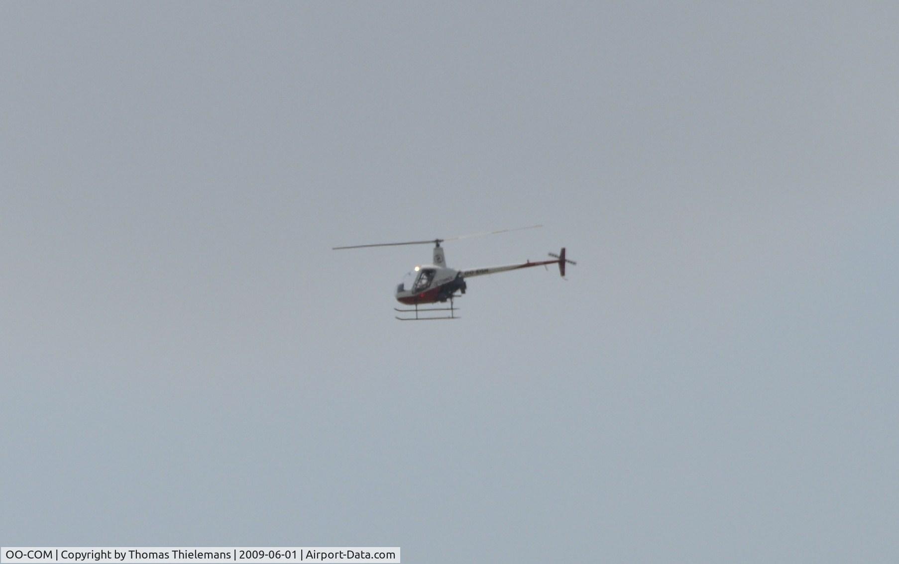 OO-COM, Schweizer 269C C/N S-1384, in flight