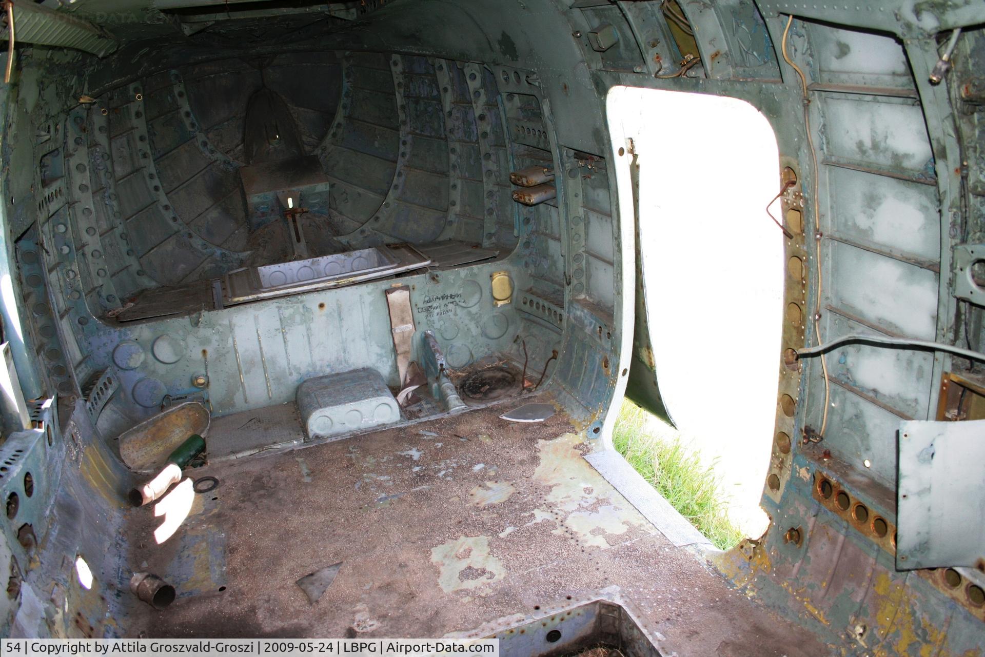 54, 1959 Mil Mi-4 C/N 12112, Bulgarian Museum of Aviation, Plovdiv-Krumovo (LBPG). The helicopter into the direction of his inside, the door and the tail part.
