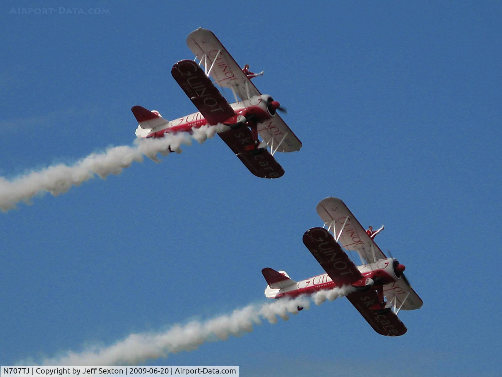 N707TJ, 1943 Boeing A75N1(PT17) C/N 75-950, In formation with N74189. Wing walking demonstration.