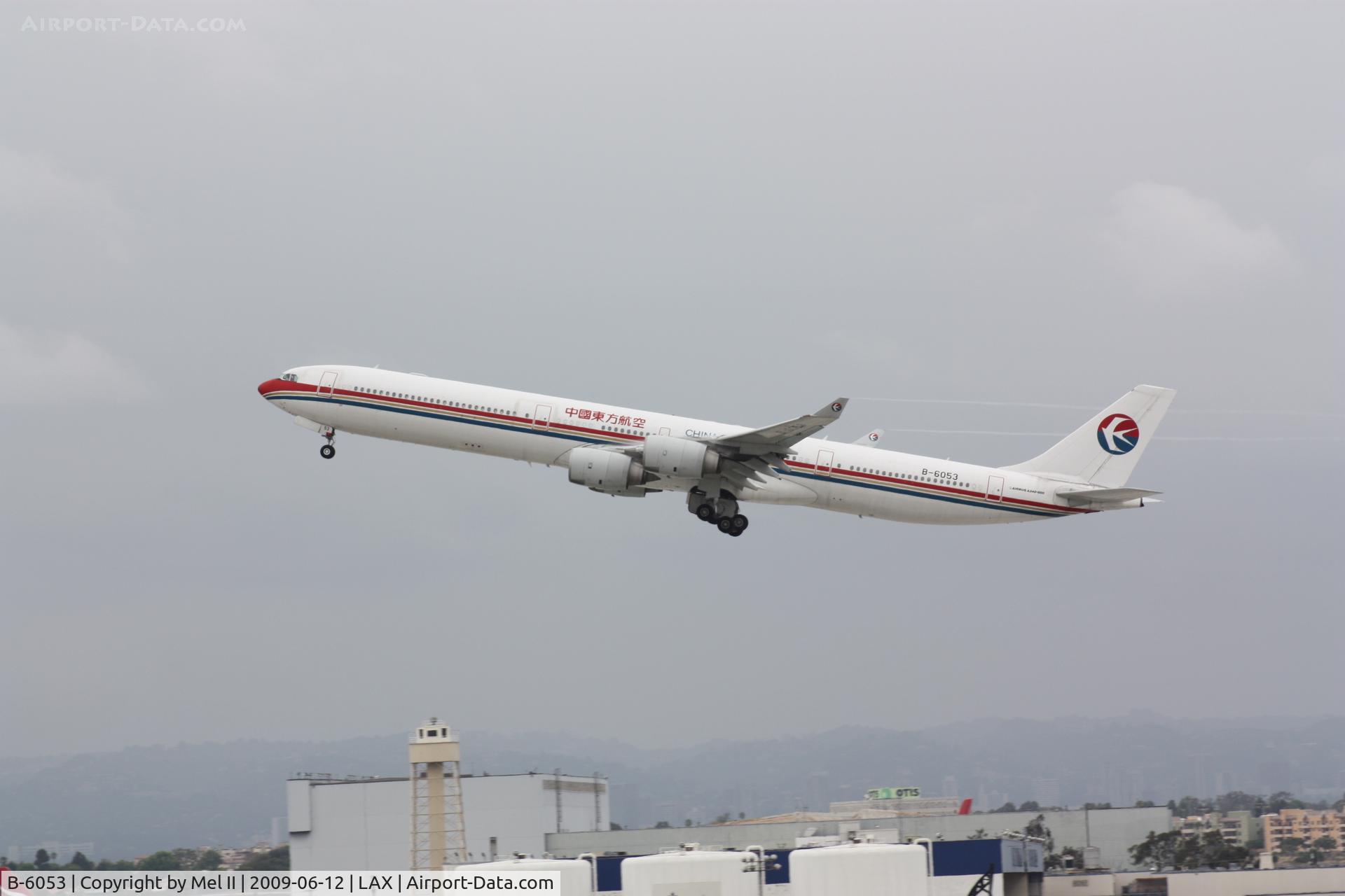 B-6053, 2004 Airbus A340-642 C/N 577, CES586 - KLAX-ZSPD - Departing RWY 25R