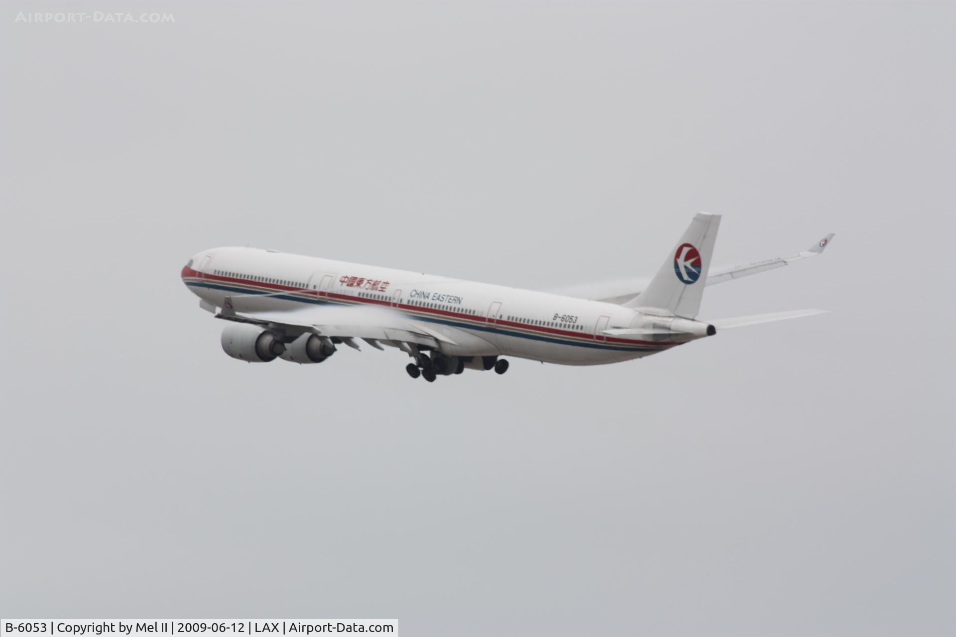 B-6053, 2004 Airbus A340-642 C/N 577, CES586 - KLAX-ZSPD - Departing RWY 25R