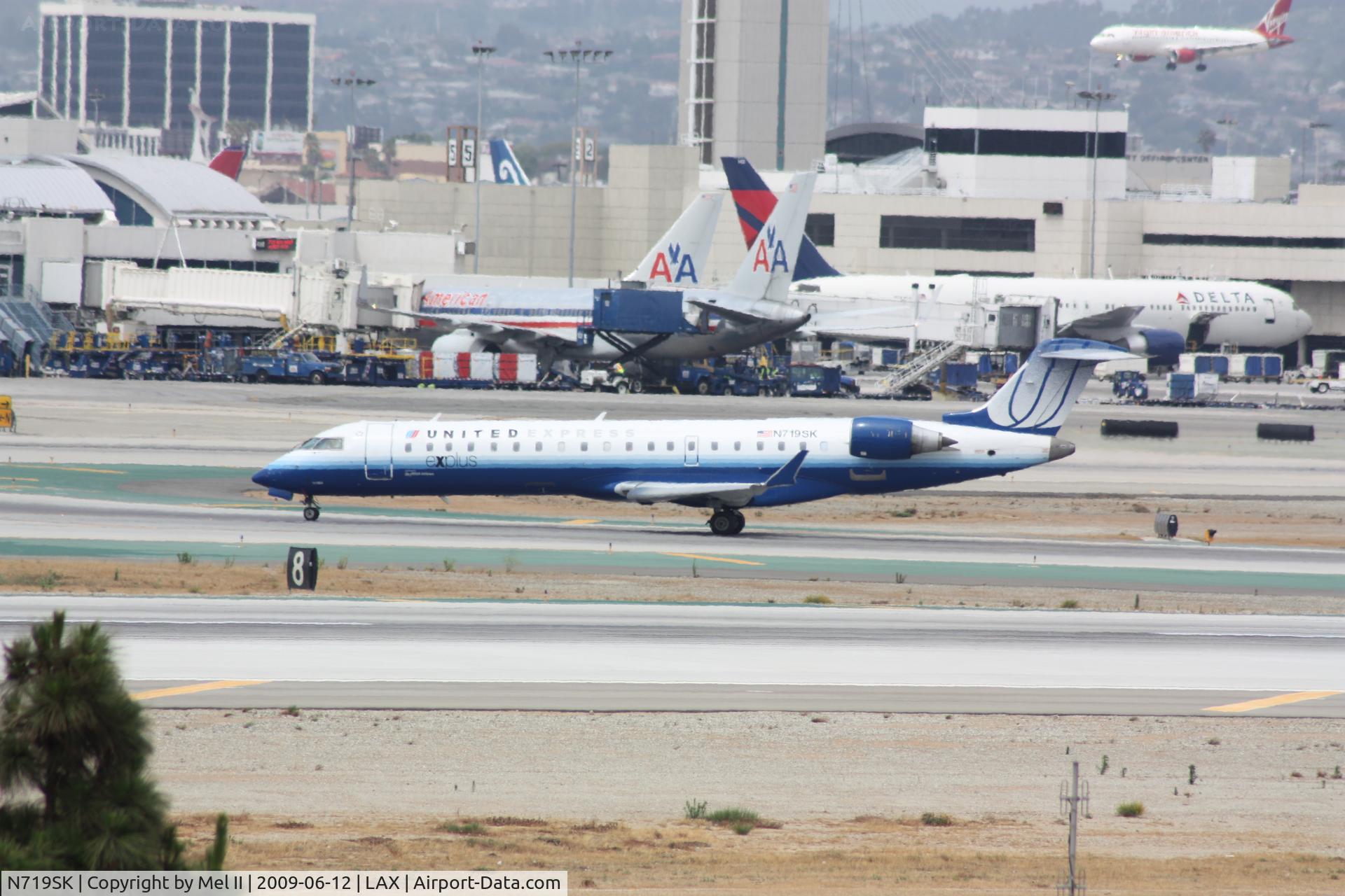 N719SK, 2004 Bombardier CRJ-701ER (CL-600-2C10) Regional Jet C/N 10188, SKW6003 - KSEA-KLAX - Landing RWY 25L