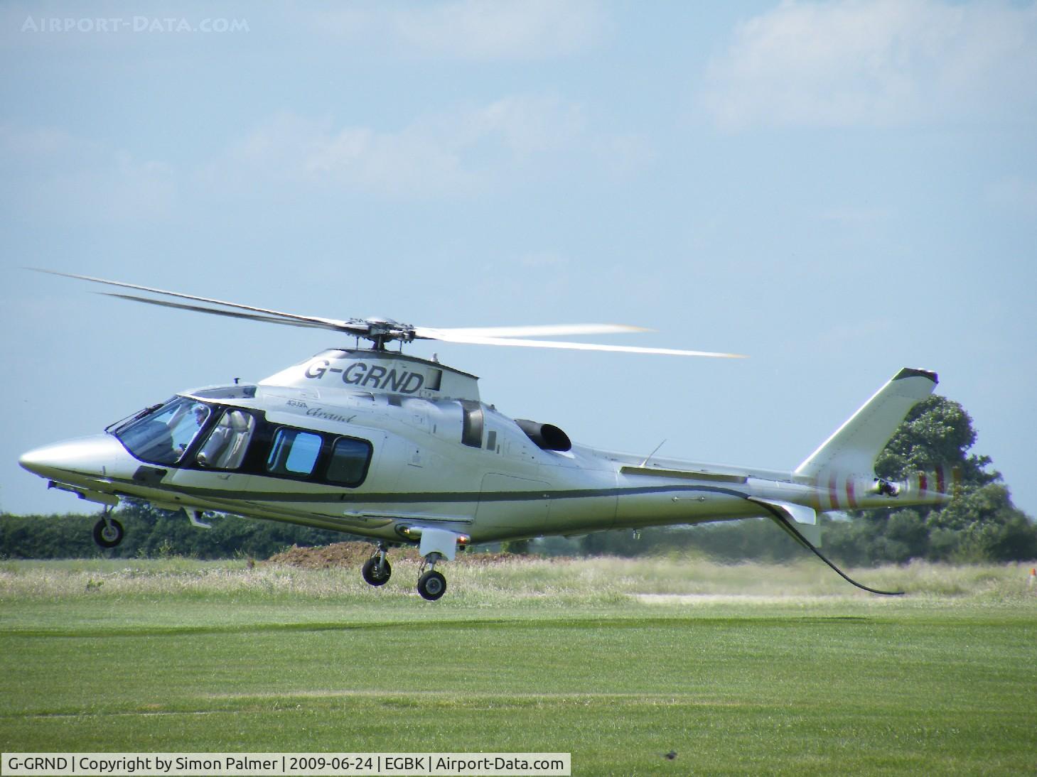 G-GRND, 2005 Agusta A-109S Grand C/N 22009, A109S Grand about to touch down at Sywell