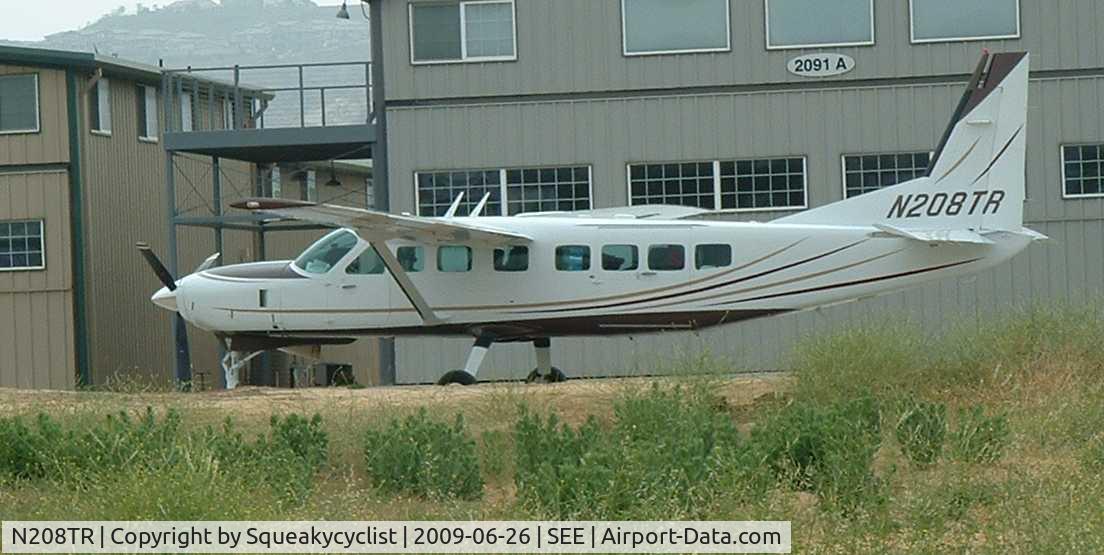 N208TR, 2005 Cessna 208B C/N 208B1151, Taken through fence at Gillespie Field, El Cajon, CA.