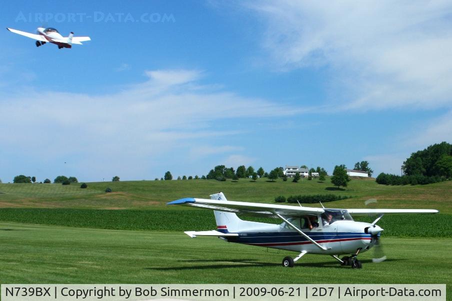 N739BX, 1978 Cessna 172N C/N 17270423, Father's Day fly-in at Beach City, Ohio. N132BN departing in the background.