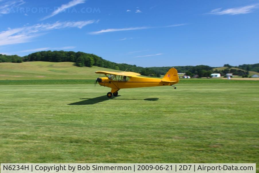 N6234H, 1946 Piper J3C-65 Cub C/N 19408, Landing on 28 at the Beach City, Ohio Father's Day fly-in.