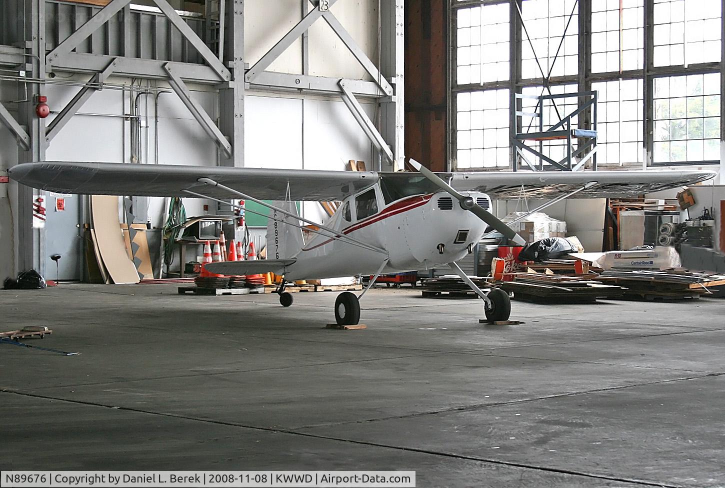 N89676, 1946 Cessna 140 C/N 8724, Tucked in the corner of cavernous hangar at NAS Wildwood, accompanied by Naval museum pieces, was this lovely little Cessna 140.