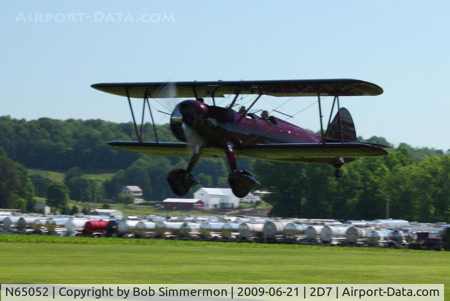 N65052, 1943 Boeing A75L300 C/N 75-7704, Landing on 28 at the Beach City, Ohio Father's Day fly-in.