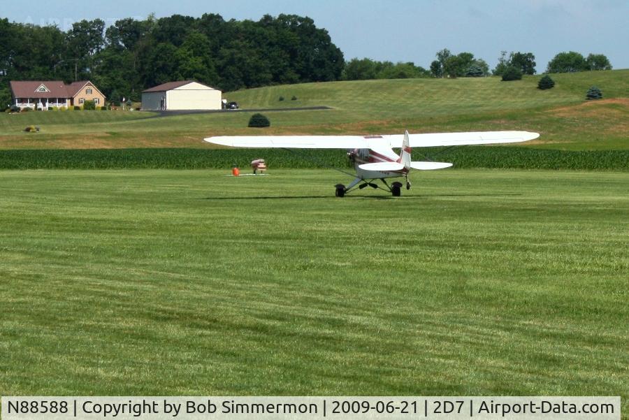 N88588, 1946 Piper J3C-65 Cub Cub C/N 16214, Departing 28 at the Beach City, Ohio Father's Day fly-in.