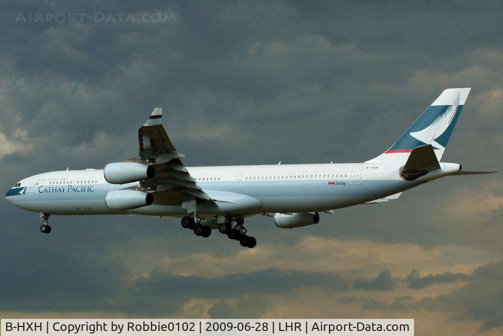 B-HXH, Airbus A340-313 C/N 218, dark background