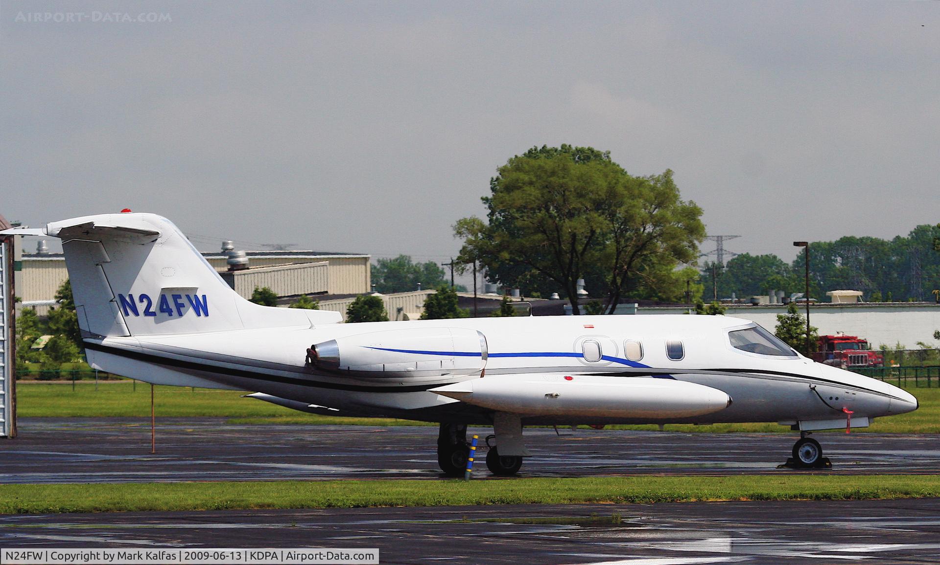 N24FW, 1976 Gates Learjet 24E C/N 329, Learjet 24E N24FW, a beautiful old bird waiting to be flown, north ramp outside KDPA FSDO.
