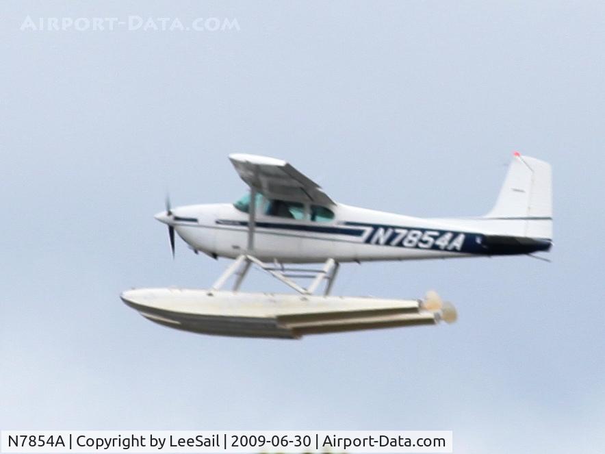 N7854A, 1956 Cessna 180A C/N 32751, Taking off to the West out of Forest Lake, MN