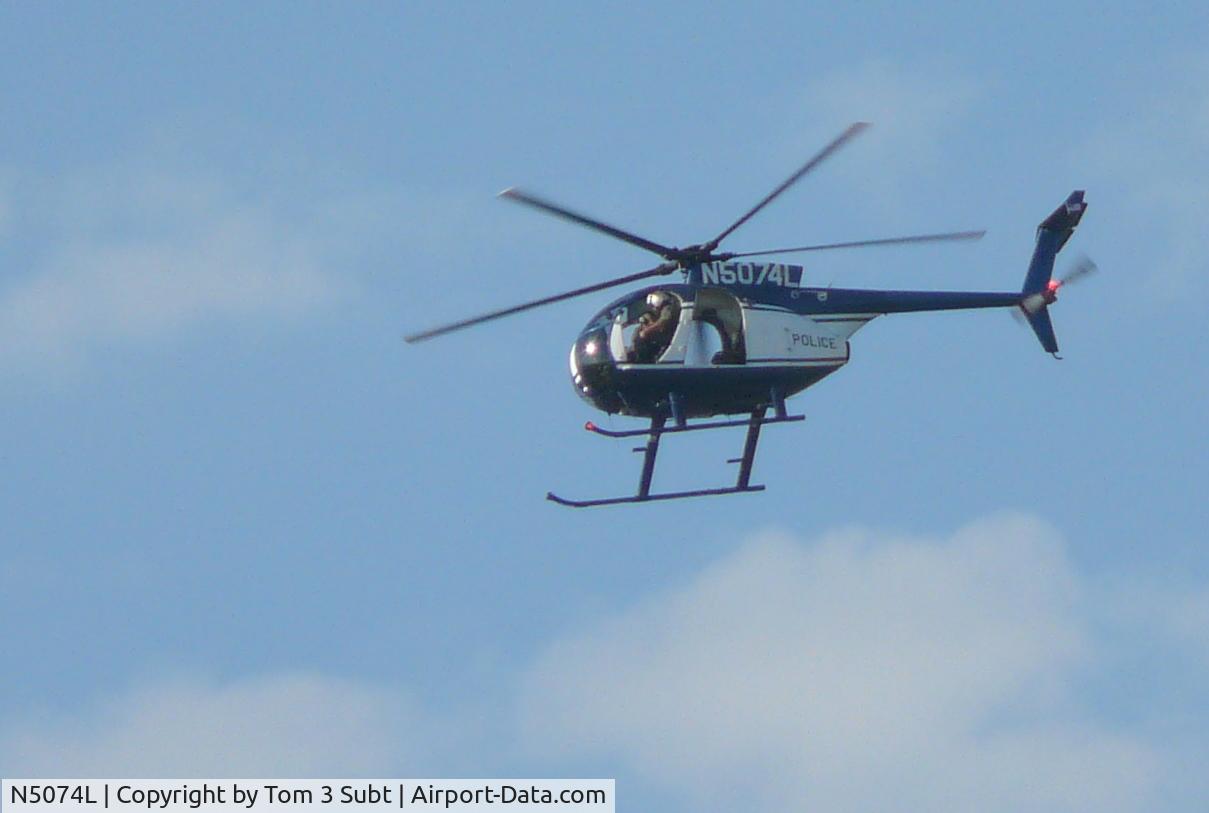 N5074L, Hughes 369D C/N 811051D, Riverside Police Department Helicopter Circling Cucamonga