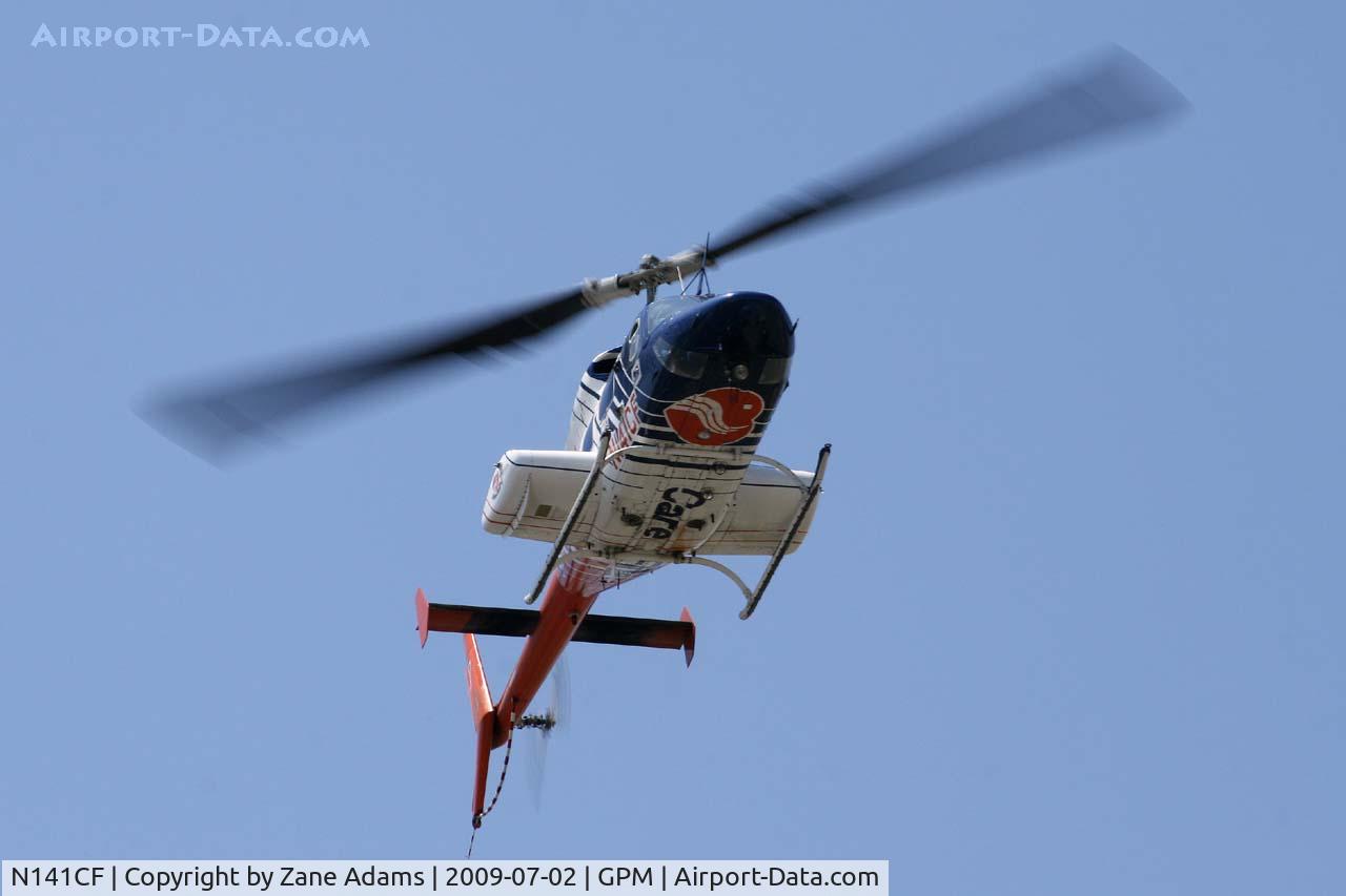 N141CF, 1984 Bell 222U C/N 47524, Care Flite landing at Grand Prairie Municipal