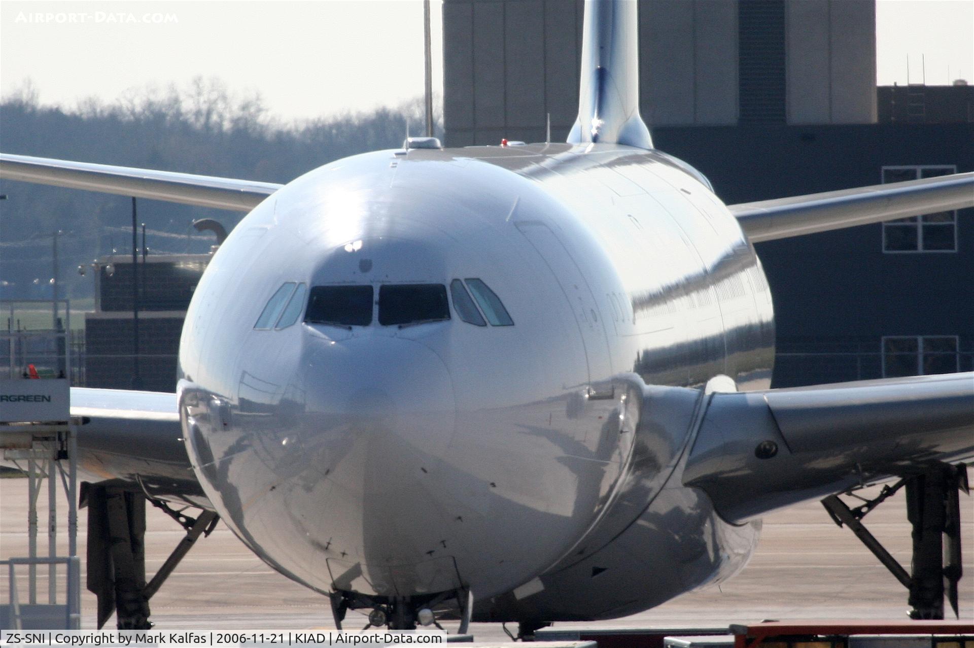 ZS-SNI, 2005 Airbus A340-642 C/N 630, R ramp parking KIAD