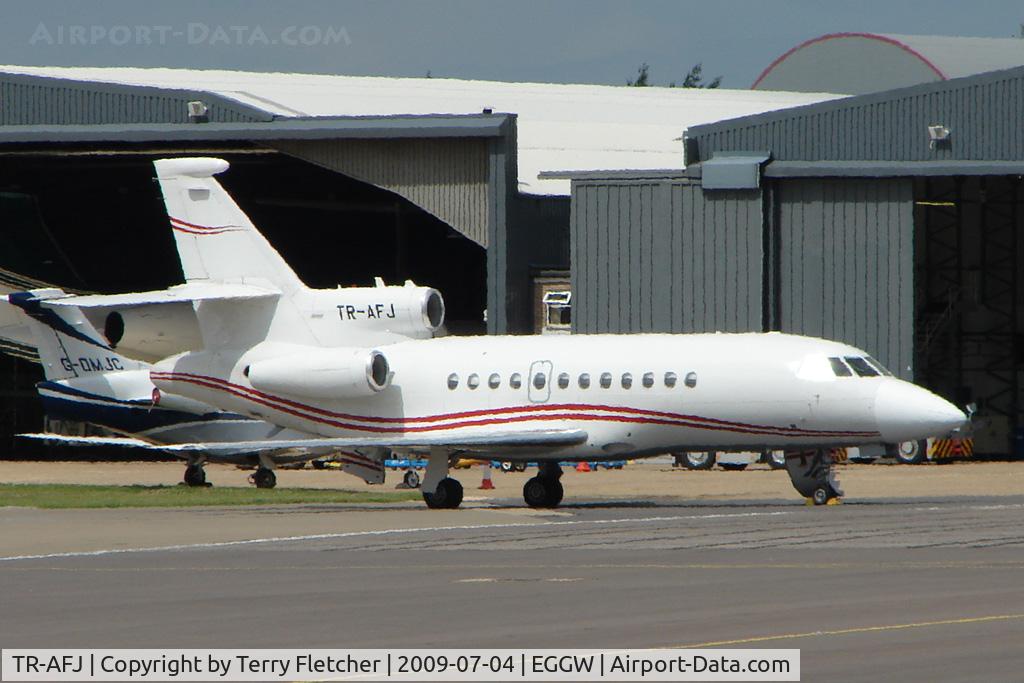 TR-AFJ, 1988 Dassault-Breguet Falcon (Mystere) 900 C/N 46, Gabonese registered Falcon thru the Luton heat haze