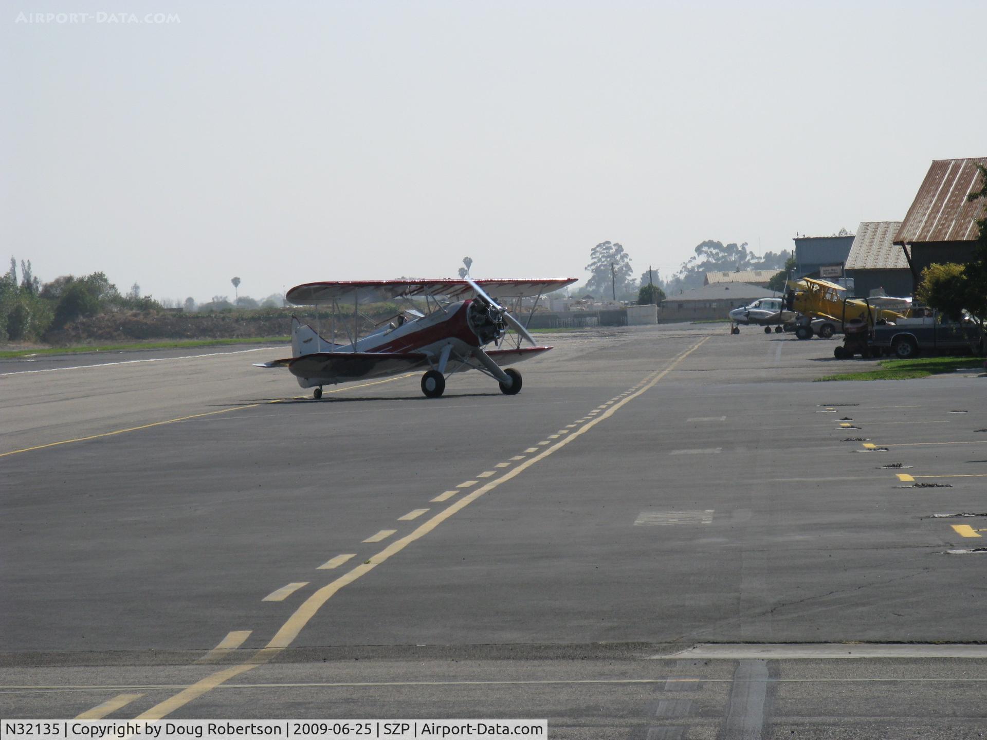 N32135, 1941 Waco UPF-7 C/N 5767, 1941 Waco UPF-7, Continental W670 220 Hp, a stunning showplane, taxi off Rwy 22