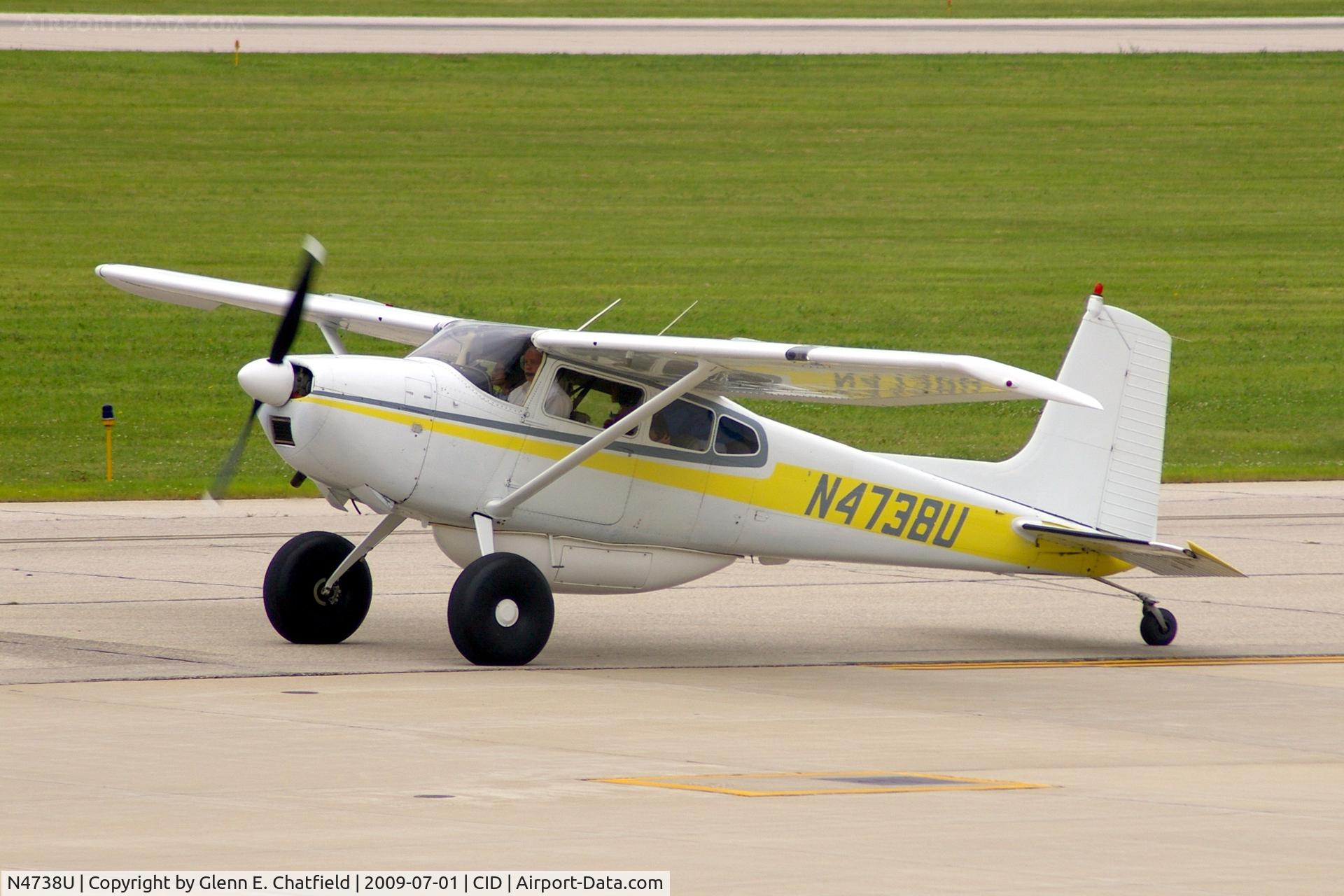 N4738U, 1964 Cessna 180G C/N 18051438, Taxiing to Runway 31 for departure.  Balloon tires