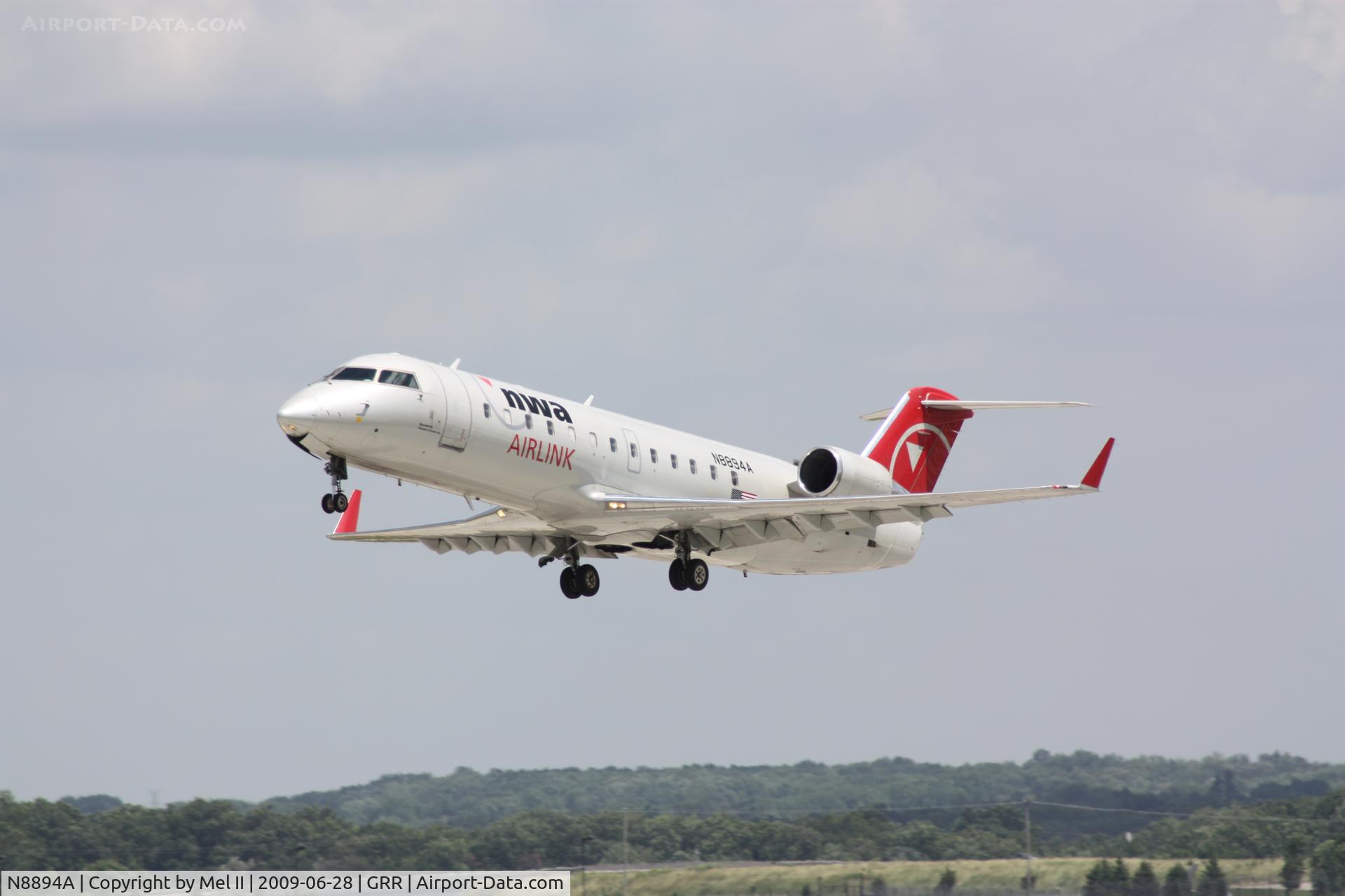 N8894A, 2003 Canadair CRJ-200LR (CL-600-2B19) C/N 7894, FLG2427 - KGRR-KMSP - Departing RWY 26L