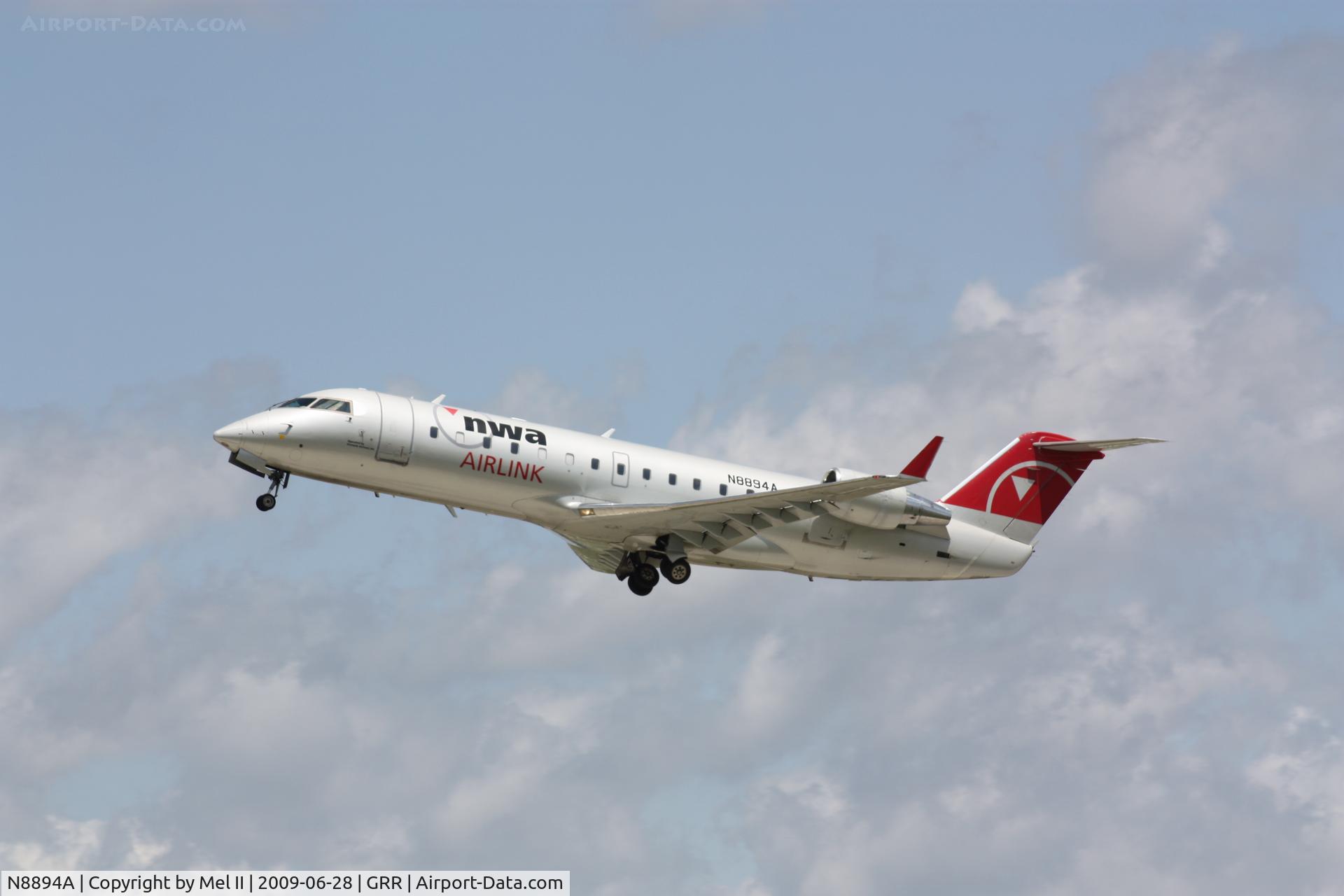N8894A, 2003 Canadair CRJ-200LR (CL-600-2B19) C/N 7894, FLG2427 - KGRR-KMSP - Departing RWY 26L