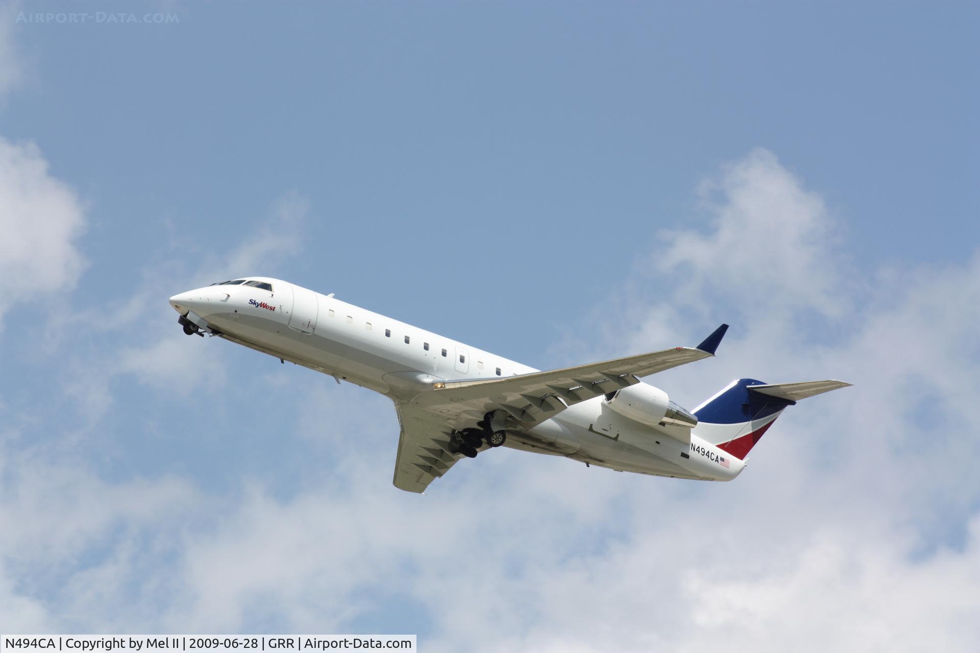 N494CA, 2003 Bombardier CRJ-200ER (CL-600-2B19) C/N 7765, SKW2639 - KGRR-KMKE - Departing RWY 26L