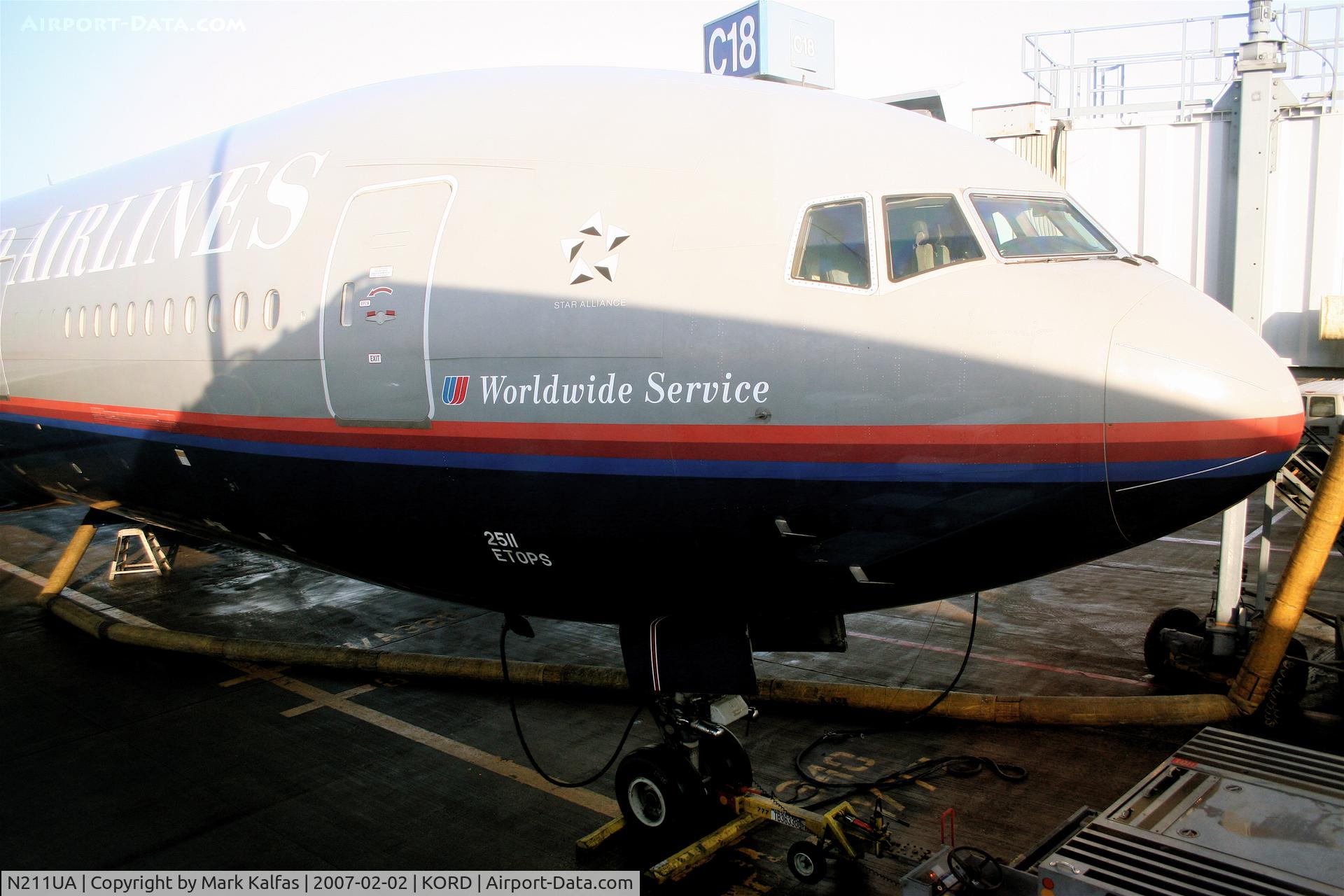 N211UA, 2000 Boeing 777-222 C/N 30217, United Airlines Boeing 777-222 at C18 KORD, getting ready for her first leg of the day to PHOG.