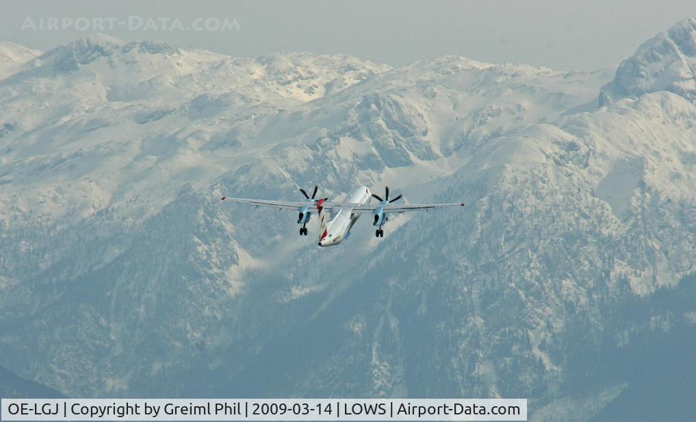OE-LGJ, 2005 De Havilland Canada DHC-8-402Q Dash 8 C/N 4104, Austrian arrows and the beautiful austrian mountains