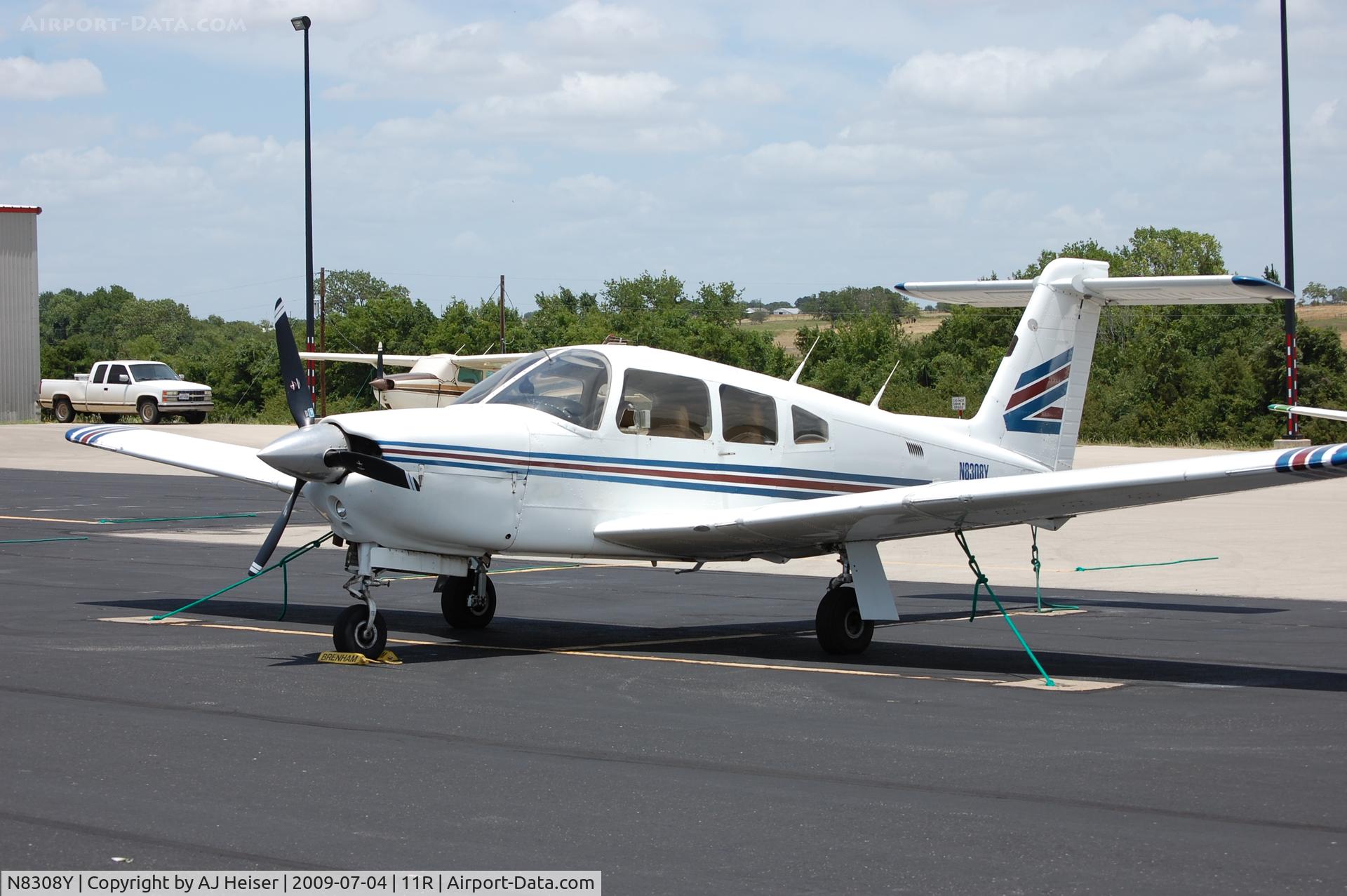 N8308Y, 1980 Piper PA-28RT-201 Arrow IV C/N 28R-8118039, N8308Y on the ramp at 11R