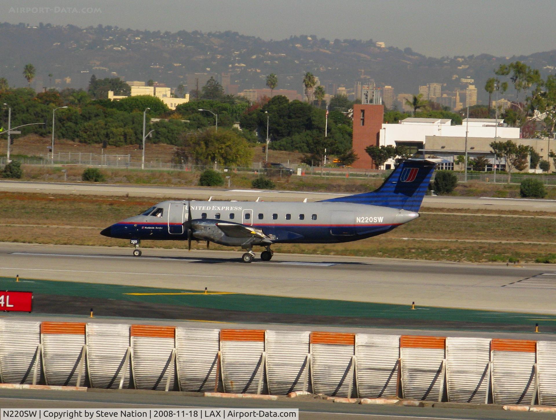 N220SW, 1994 Embraer EMB-120ER Brasilia C/N 120.288, United Express 1994 Embraer EMB-120ER in latest colors