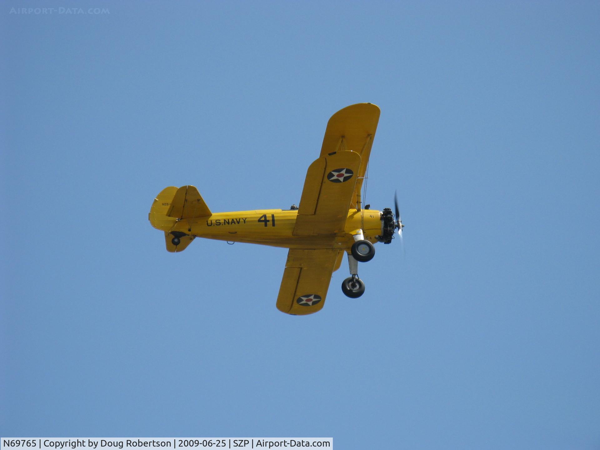N69765, 1941 Boeing A75N1 (PT17) C/N 75-1044, 1941 Boeing Stearman A75N1 (PT-17 KAYDET) as Navy  N2S-1, Continental W-670 220 Hp, takeoff climb Rwy 22