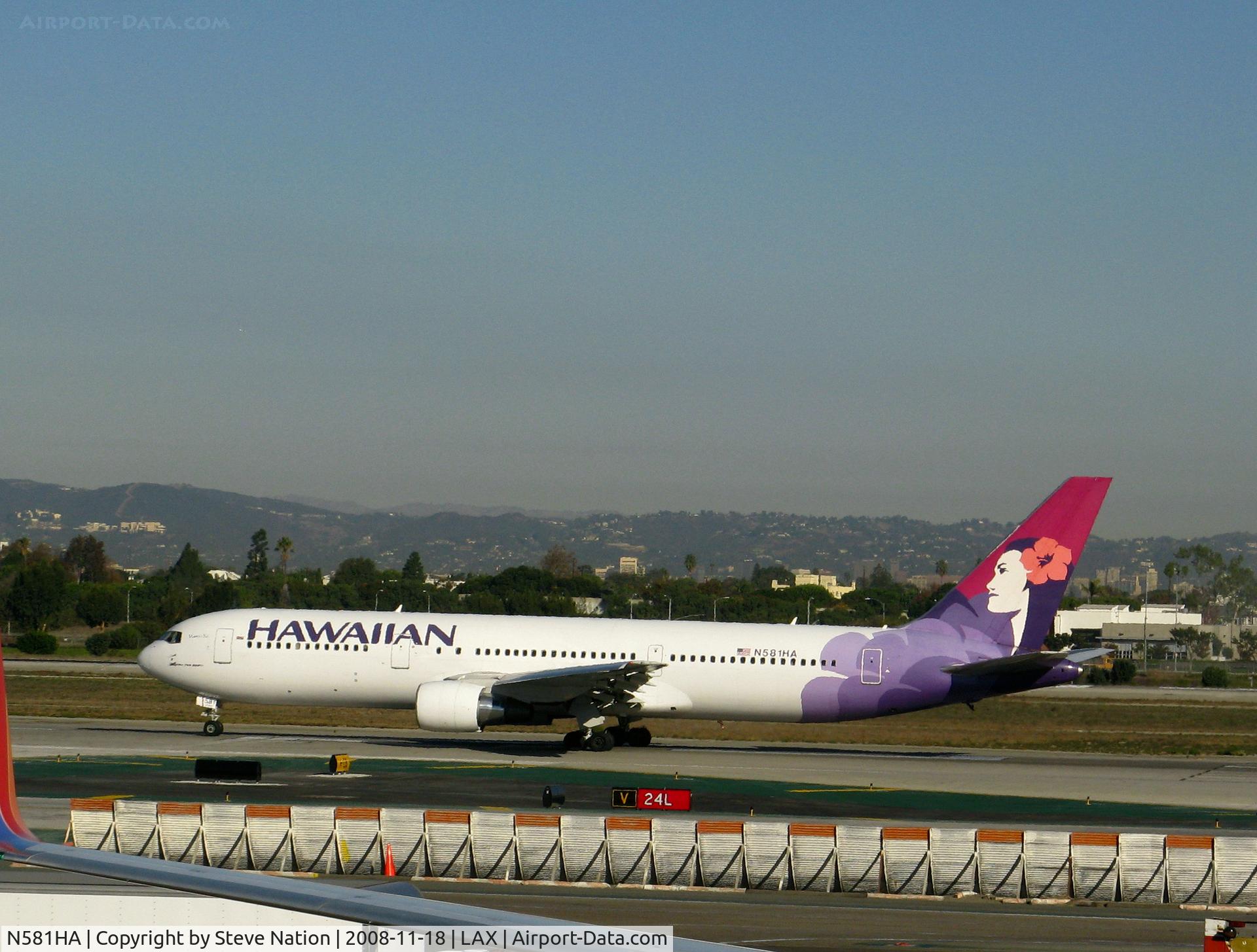 N581HA, 2001 Boeing 767-33A C/N 28141, Hawaiian 2001 767-33A 'Manu o Ko' rolling on RW 24L