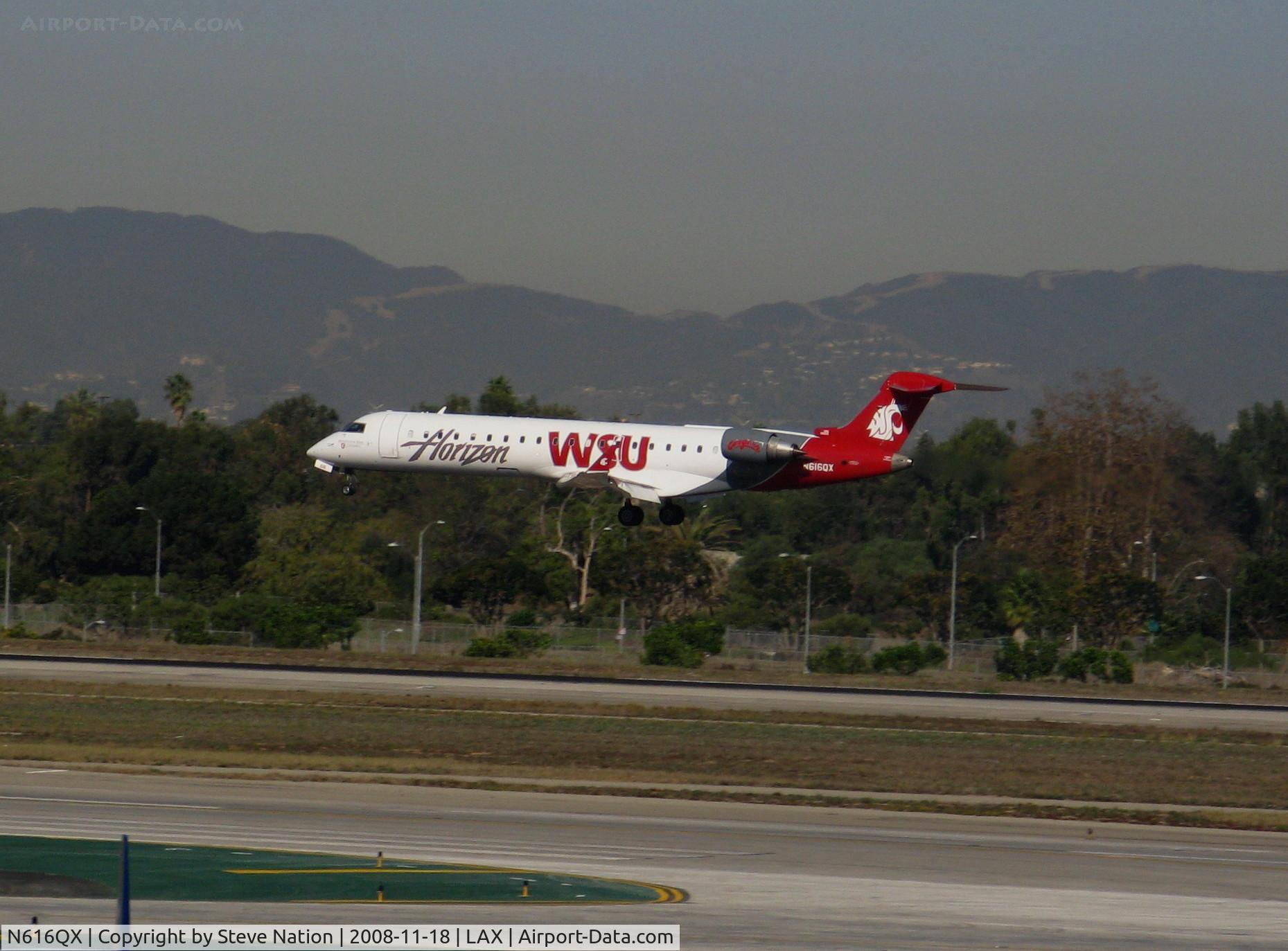 N616QX, 2003 Bombardier CRJ-701 (CL-600-2C10) C/N 10128, Horizon 2003 Bombardier CL-600-2C10 in 'WSU' (Washington State University) special colors landing on RW 24R