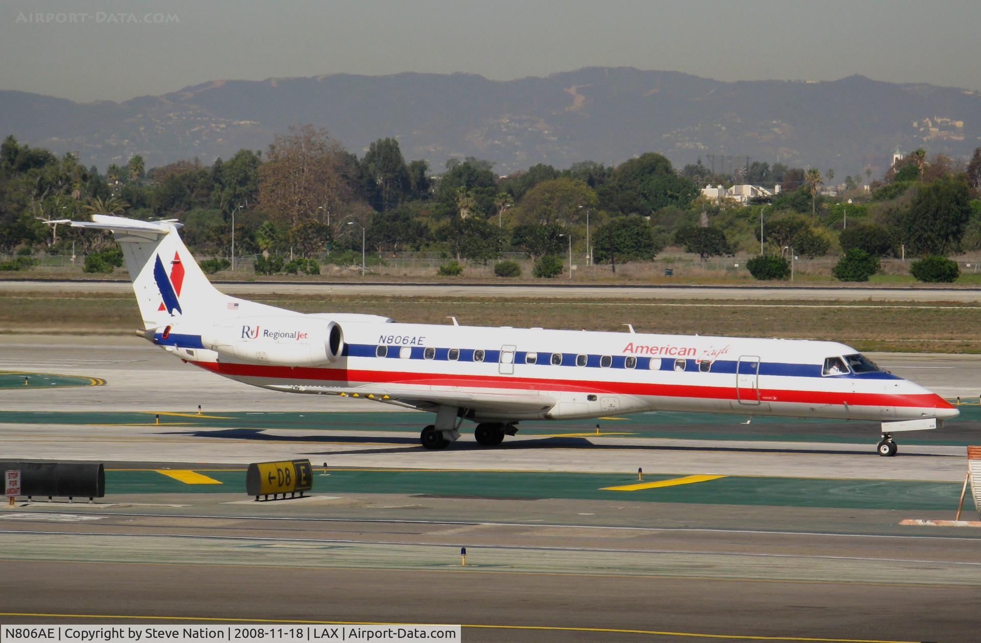 N806AE, 2001 Embraer ERJ-140LR (EMB-135KL) C/N 145503, American Express 2001 Embraer EMB-135KL taxiing to RW 24L