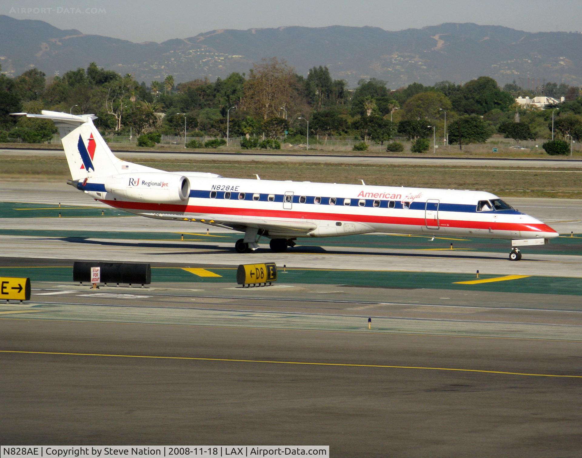 N828AE, 2002 Embraer ERJ-140LR (EMB-135KL) C/N 145604, American Express 2002 Embraer EMB-135KL taxiing to RW 24L