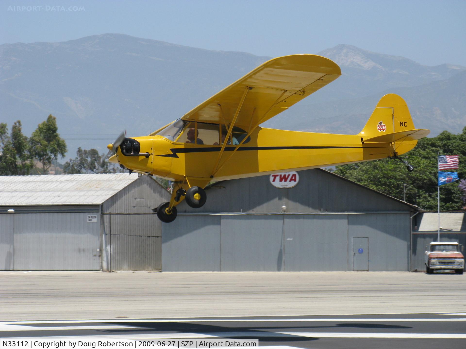 N33112, 1940 Piper J3C-65 Cub Cub C/N 5830, 1940 Piper J3C-65 CUB, Continental C90 90 Hp upgrade, on final Rwy 22