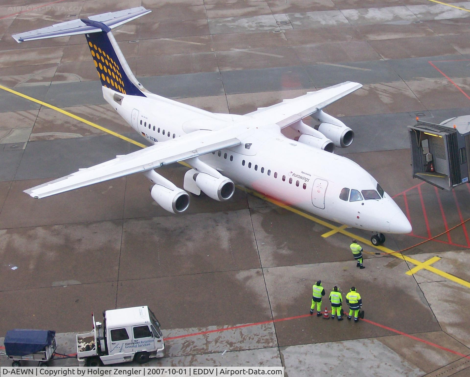 D-AEWN, 1990 British Aerospace BAe.146-300 C/N E3158, Three are looking during one is doing his work