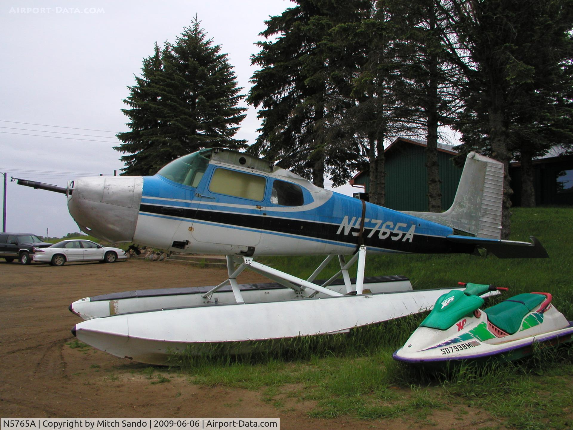 N5765A, 1956 Cessna 172 C/N 28365, In the parking lot of Anderson's Outpost near Carlos, MN.