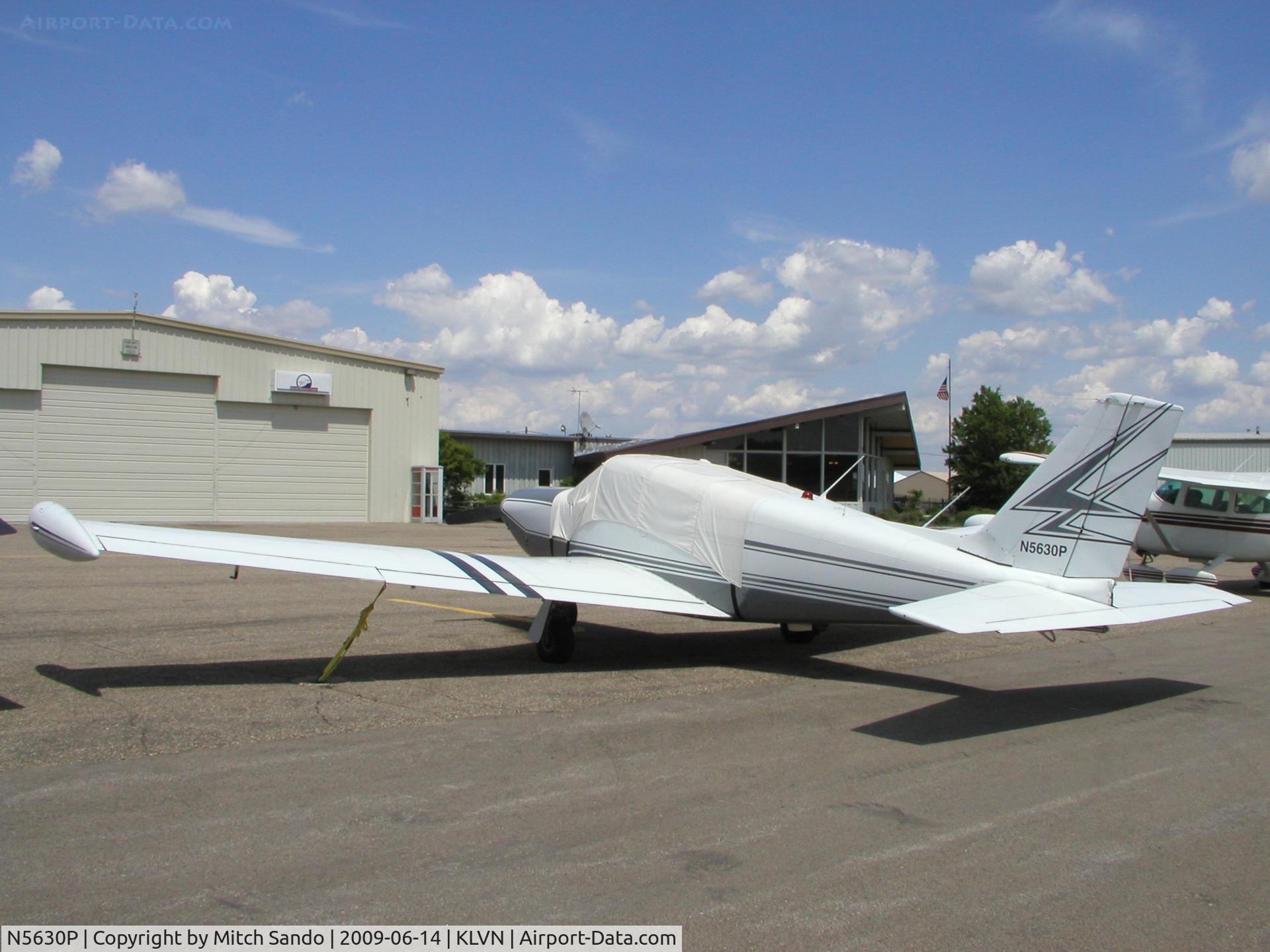 N5630P, 1959 Piper PA-24-250 Comanche C/N 24-700, Parked on the ramp at Airlake.