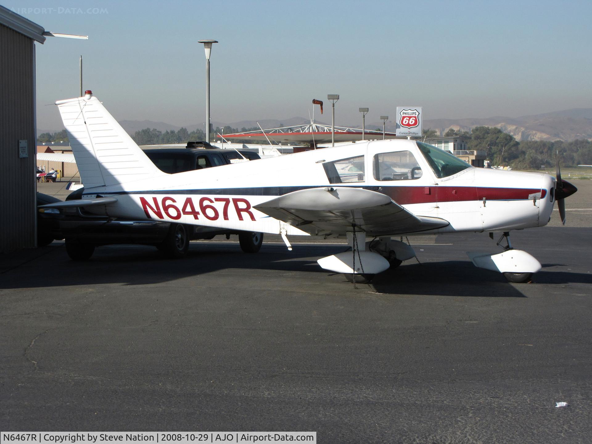 N6467R, 1966 Piper PA-28-140 C/N 28-21655, 1966 Piper PA-28-140 under the Phillips 66 sign @ 