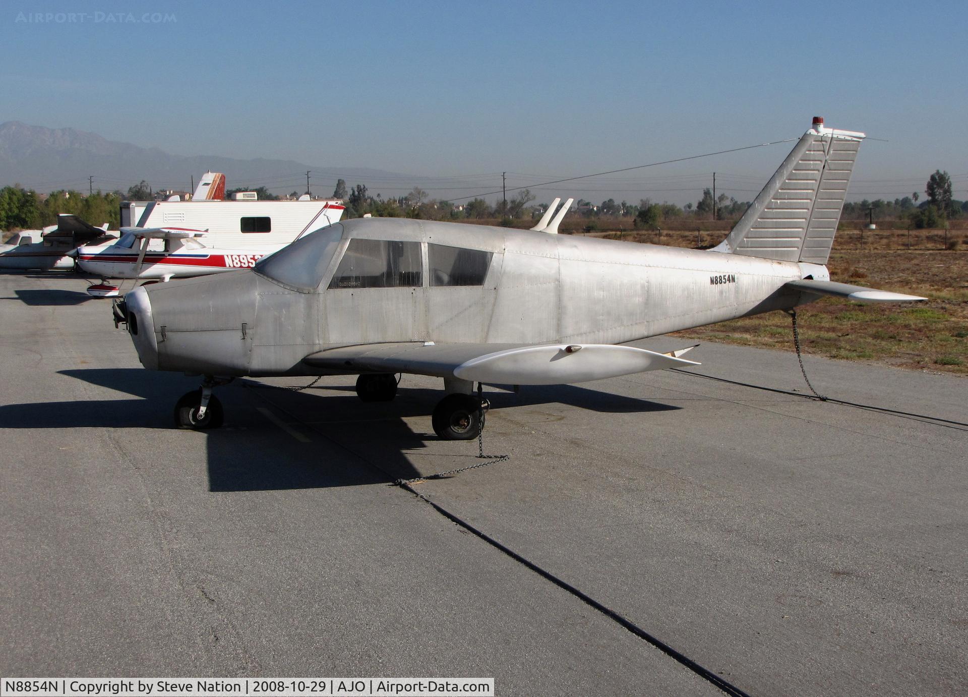 N8854N, 1969 Piper PA-28-140 C/N 28-25708, Slightly tired 1969 Piper PA-28-140 minus paint and prop @ 